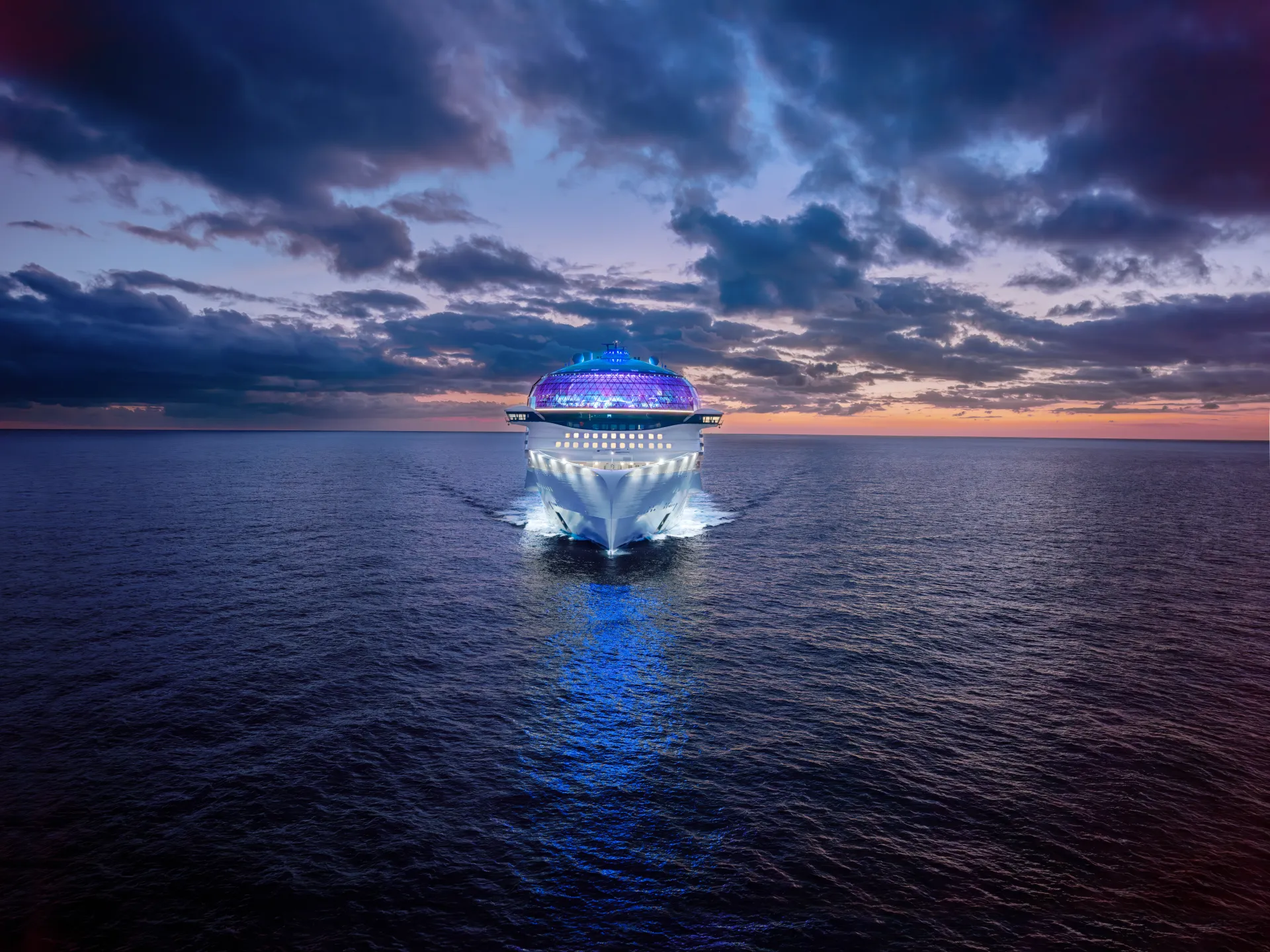 Aerial view of Royal Caribbean's Icon of the Seas in the evening
