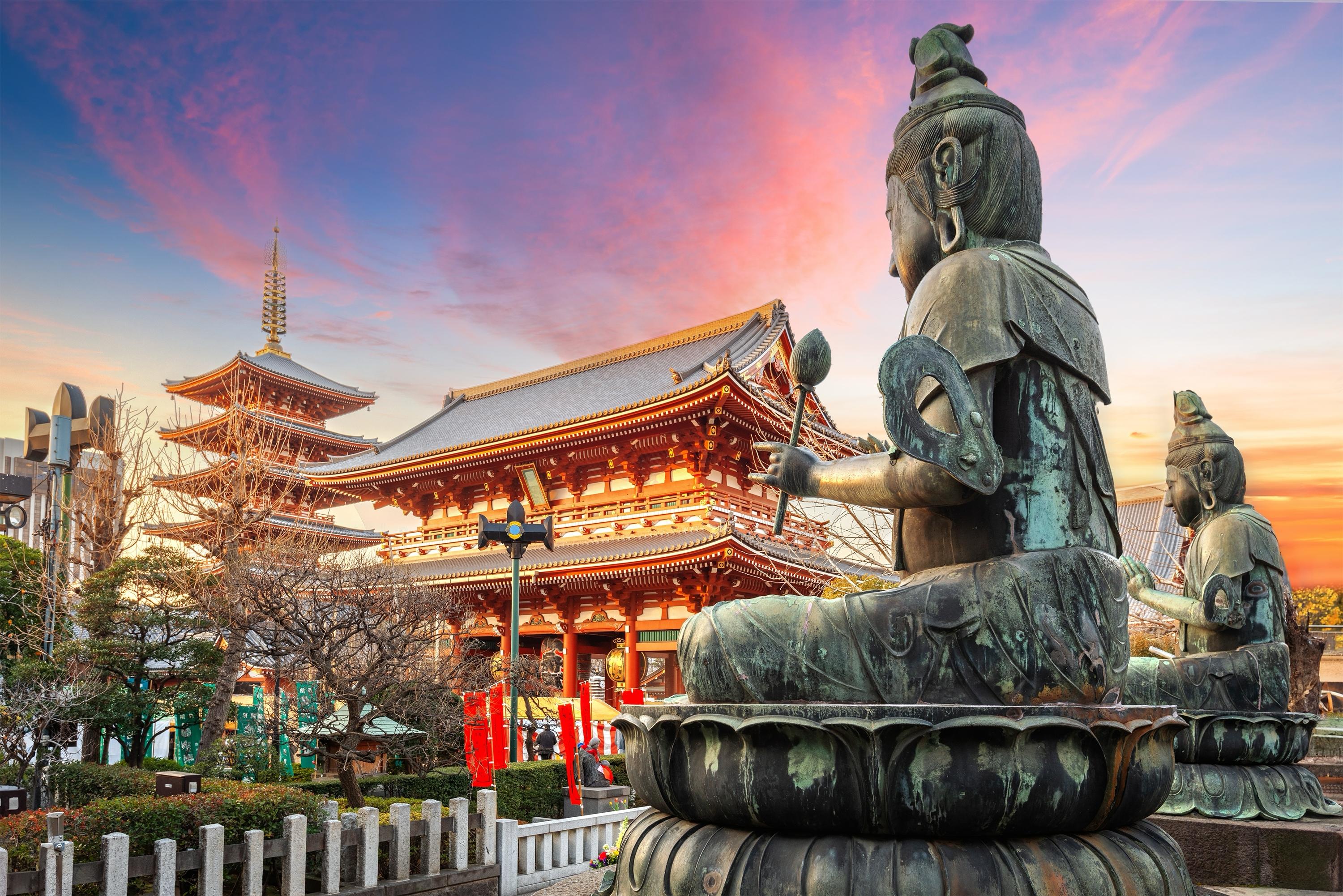 Sensoji Temple in Tokyo Japan with Buddha statue at sunset curated cultural travel experience by Angela Hughes