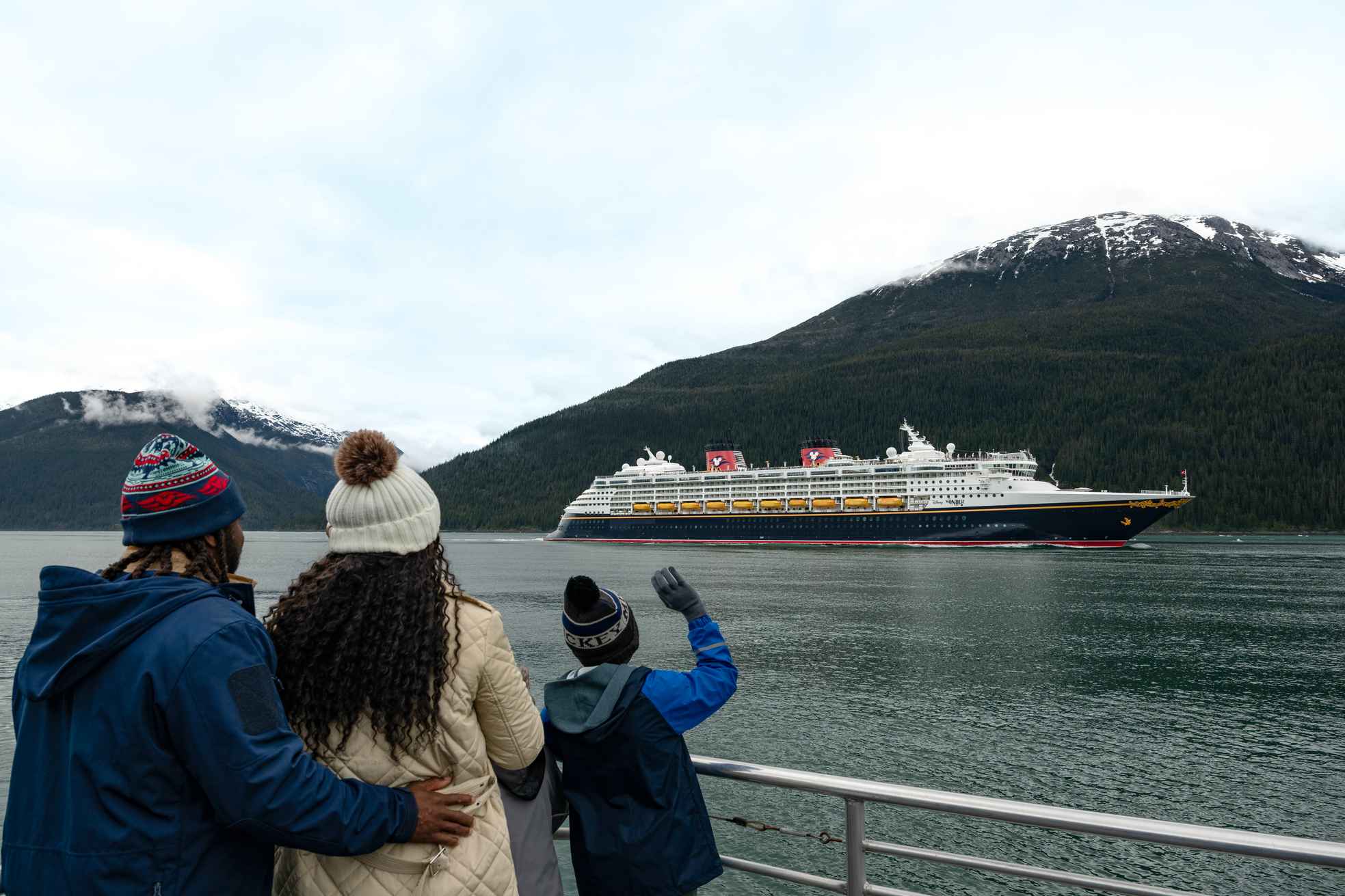 Family Watching Mountains from Disney Cruise Alaska