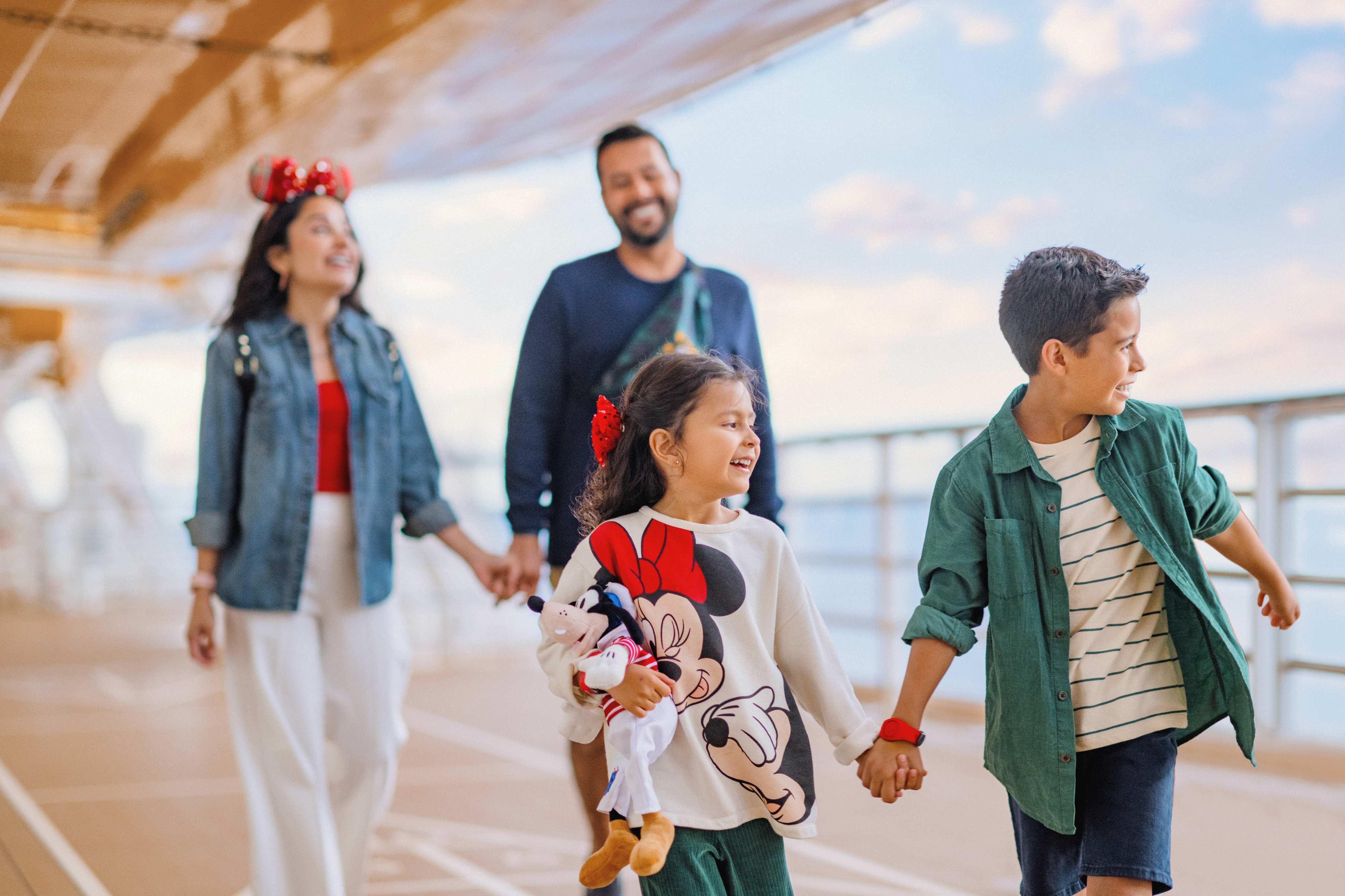 Family walking on the Promenade Deck