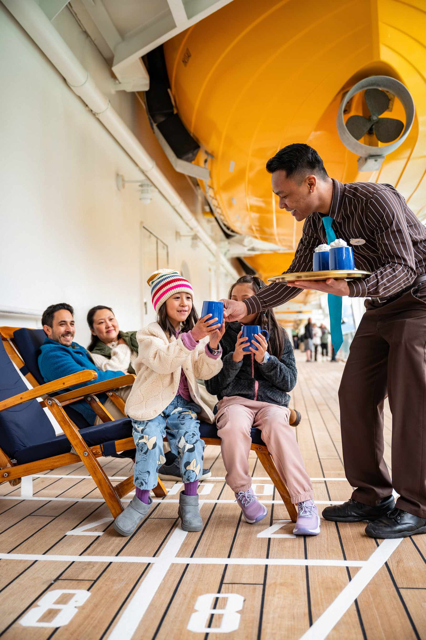 Disney Cruise Line promenade deck service during a family vacation