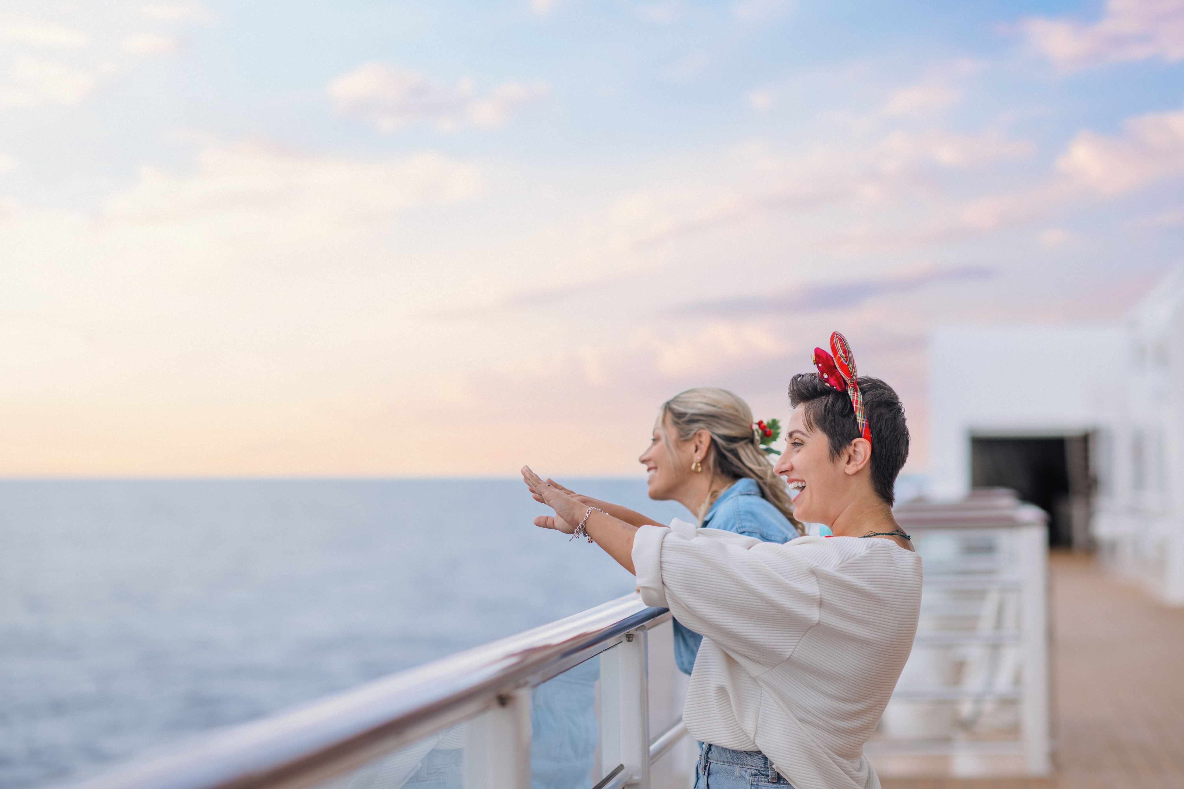 Disney Very Merrytime Cruise deck at sunset overlooking the ocean