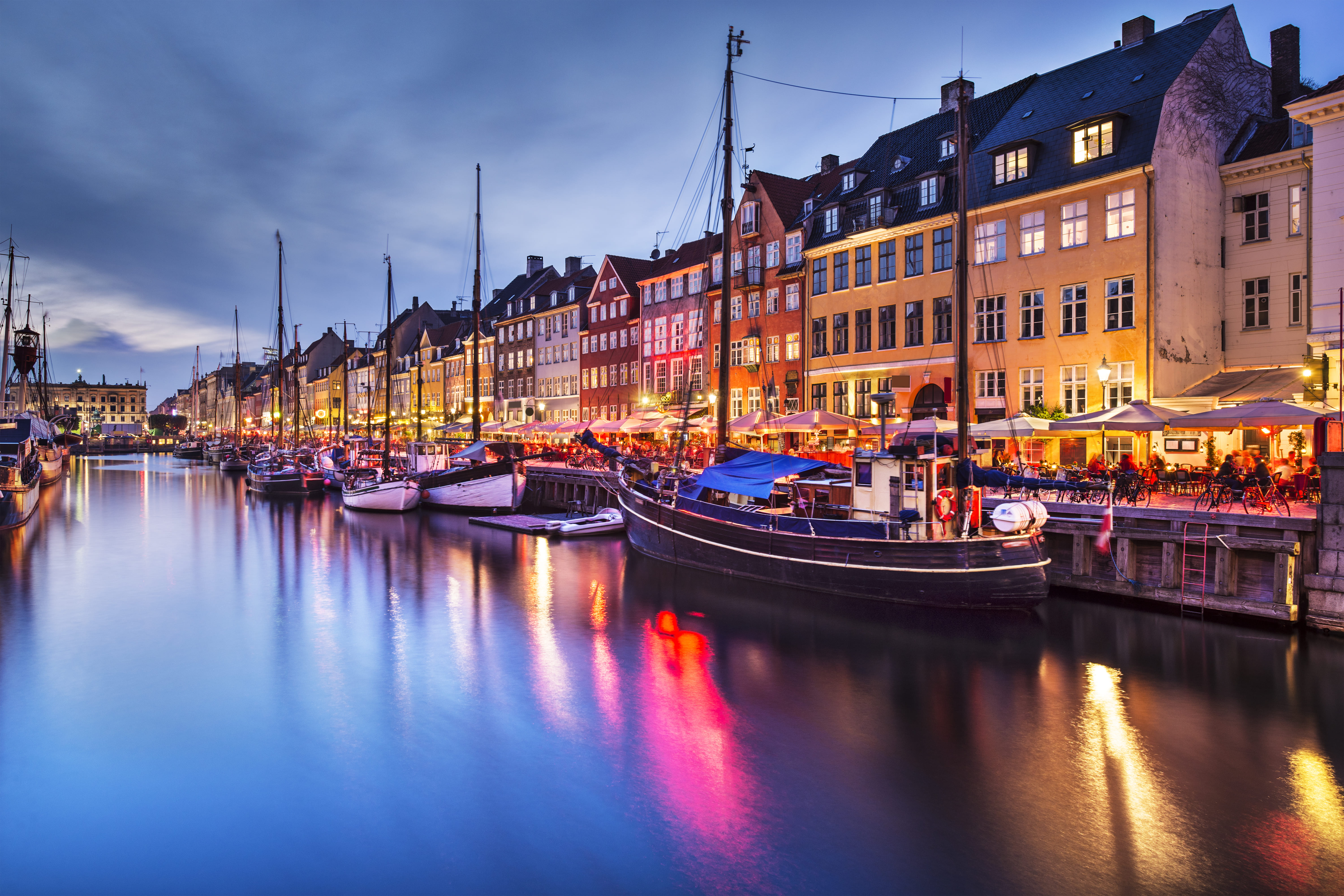 Colorful historic buildings lining the picturesque Nyhavn canal harbor in Copenhagen, Denmark